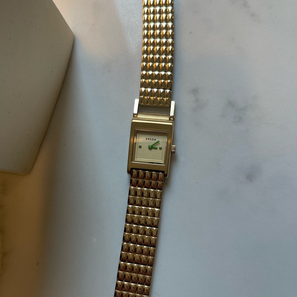 Breda gold tone watch
